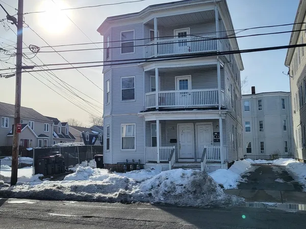 a car parked in front of a house