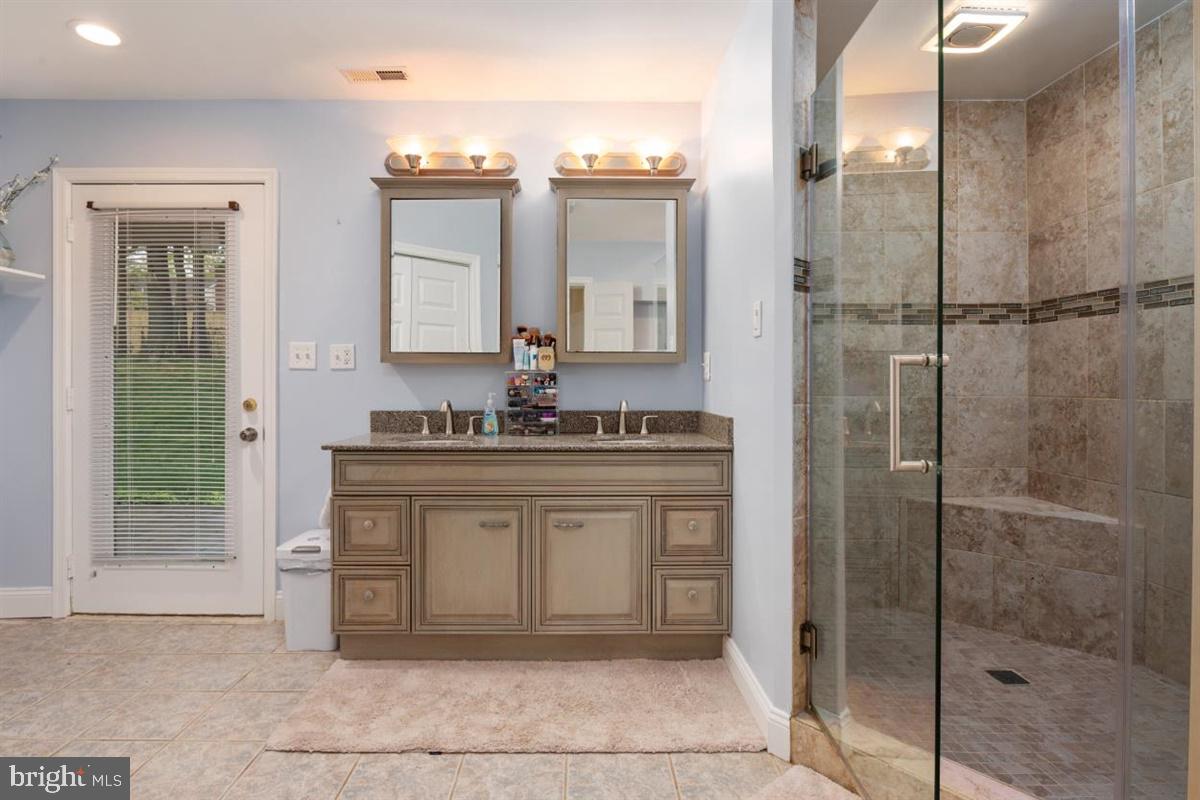 8803 Gramercy Lane Laurel, MD 20708 - Photo 21 of 43 Remodeled Master Bathroom w/Double Vanity