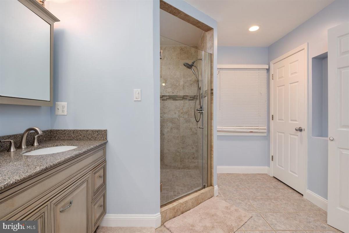8803 Gramercy Lane Laurel, MD 20708 - Photo 22 of 43 Remodeled Bathroom