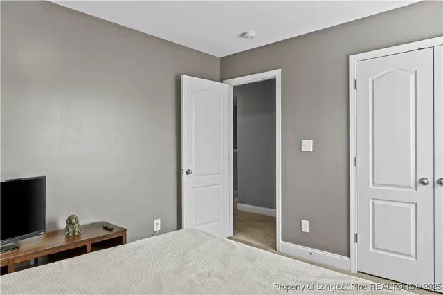 a view of a livingroom with a bathroom