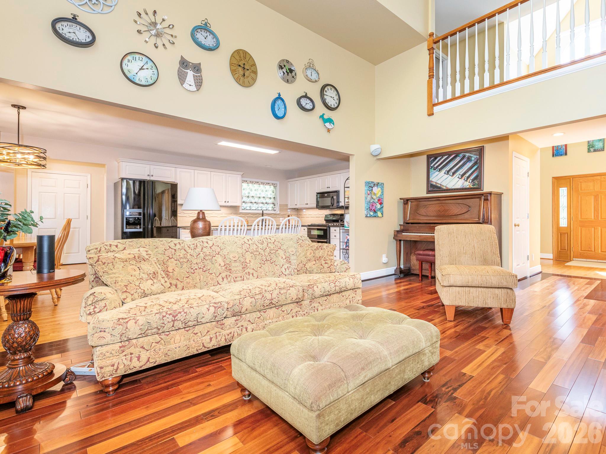 4440 Hucks Road Charlotte, NC 28269 - Photo 4 of 45 a living room with furniture and a wooden floor
