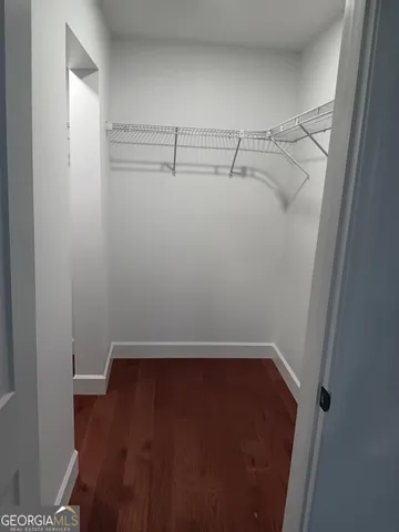 a view of a room with racks on the wall