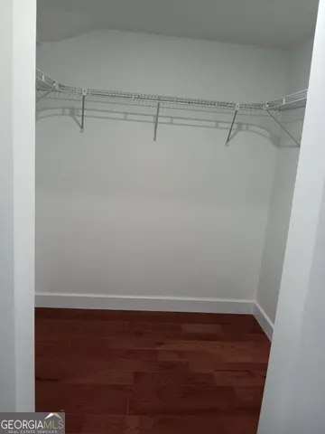 a view of a room with racks on the wall