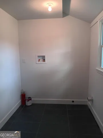 a room with water view and wooden floor