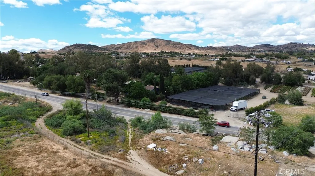 0 Old Elsinore Road, Unit 10 Perris, CA 92570 - Photo 5 of 11 a view of a street with a houses