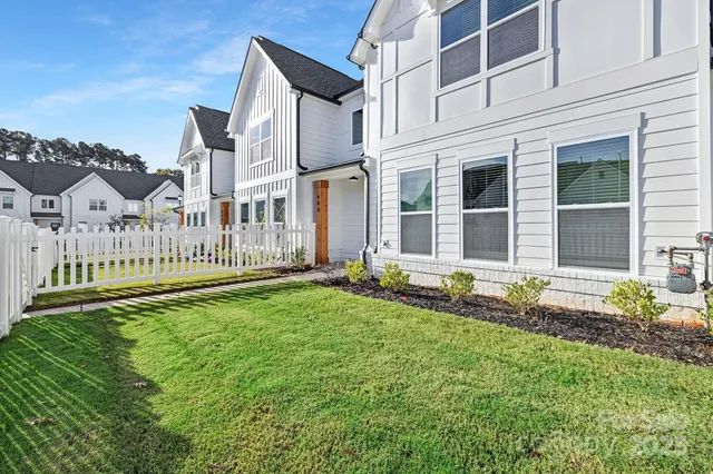 a house with garden in front of it