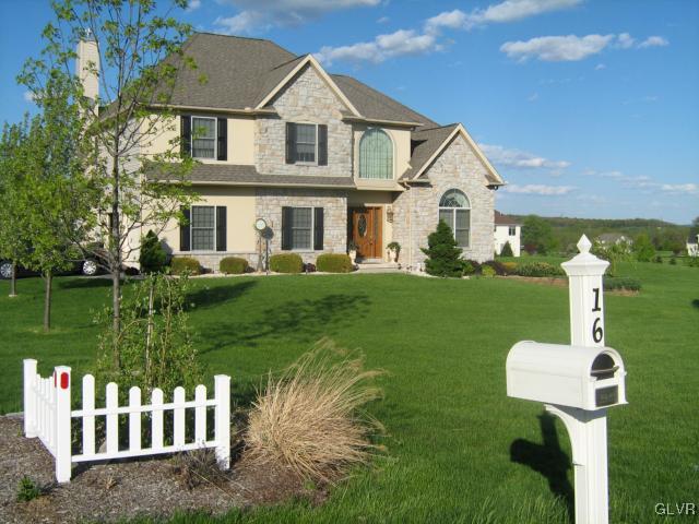 166 Heyer Road Nazareth, PA 18064 - Photo 1 of 15 a front view of a house with garden