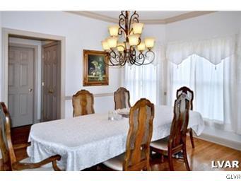 166 Heyer Road Nazareth, PA 18064 - Photo 8 of 15 a dining room with furniture and chandelier