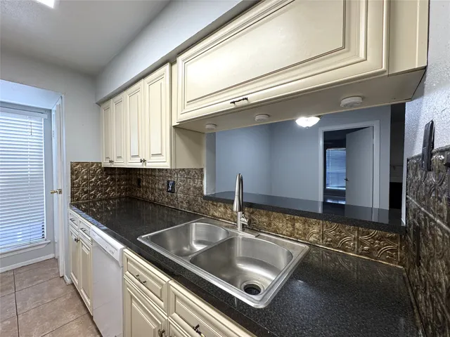 a view of a livingroom and a window