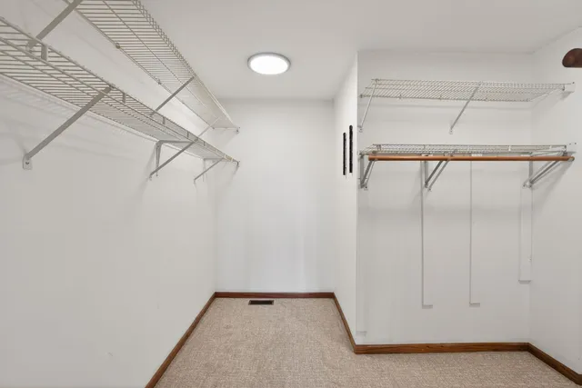 a view of an empty walk in closet