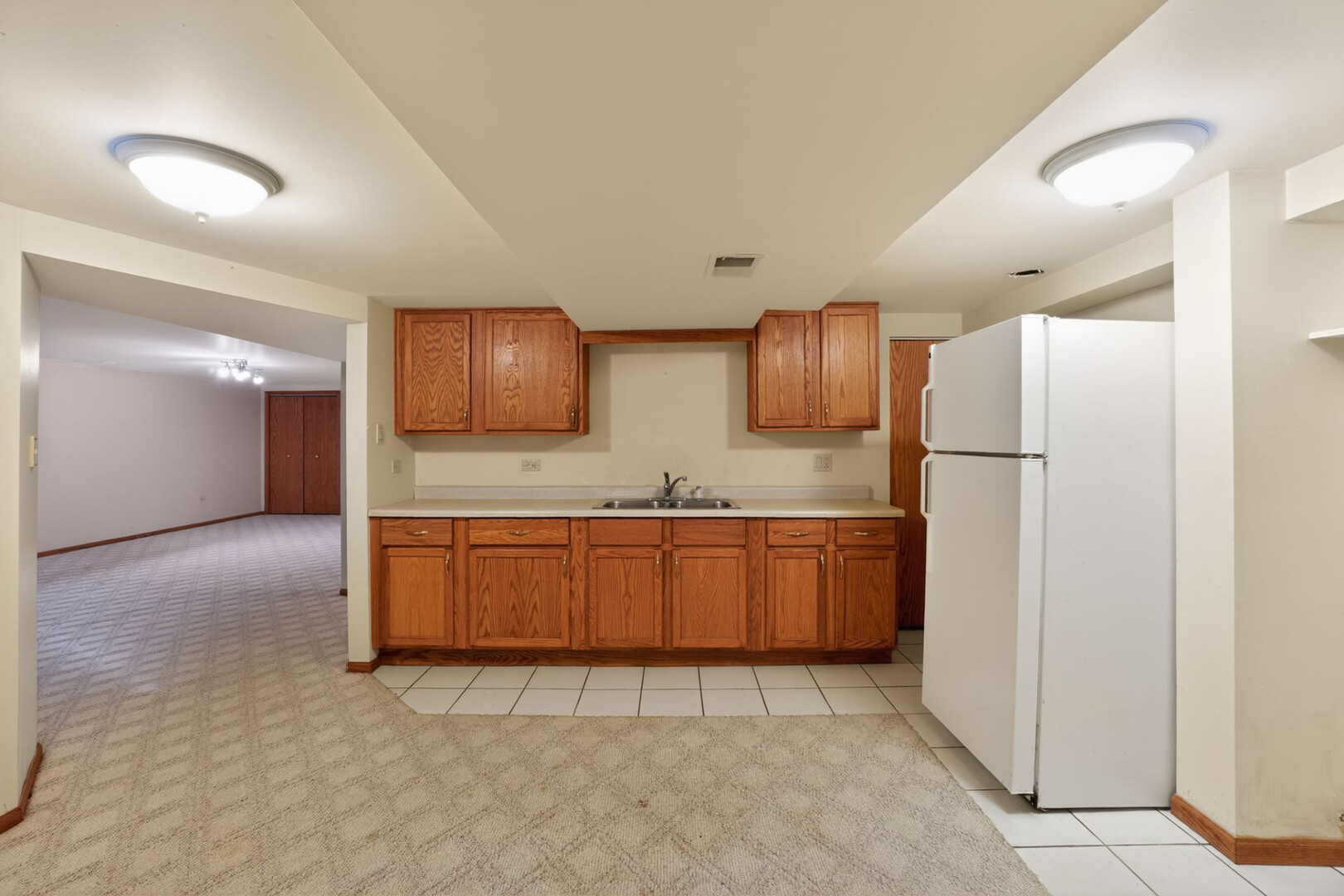 102 Wyndstone Drive Elwood, IL 60421 - Photo 27 of 31 a kitchen with stainless steel appliances granite countertop a refrigerator and a sink