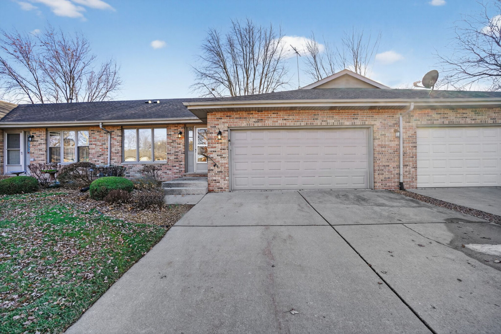 102 Wyndstone Drive Elwood, IL 60421 - Photo 30 of 31 a front view of a house with garden