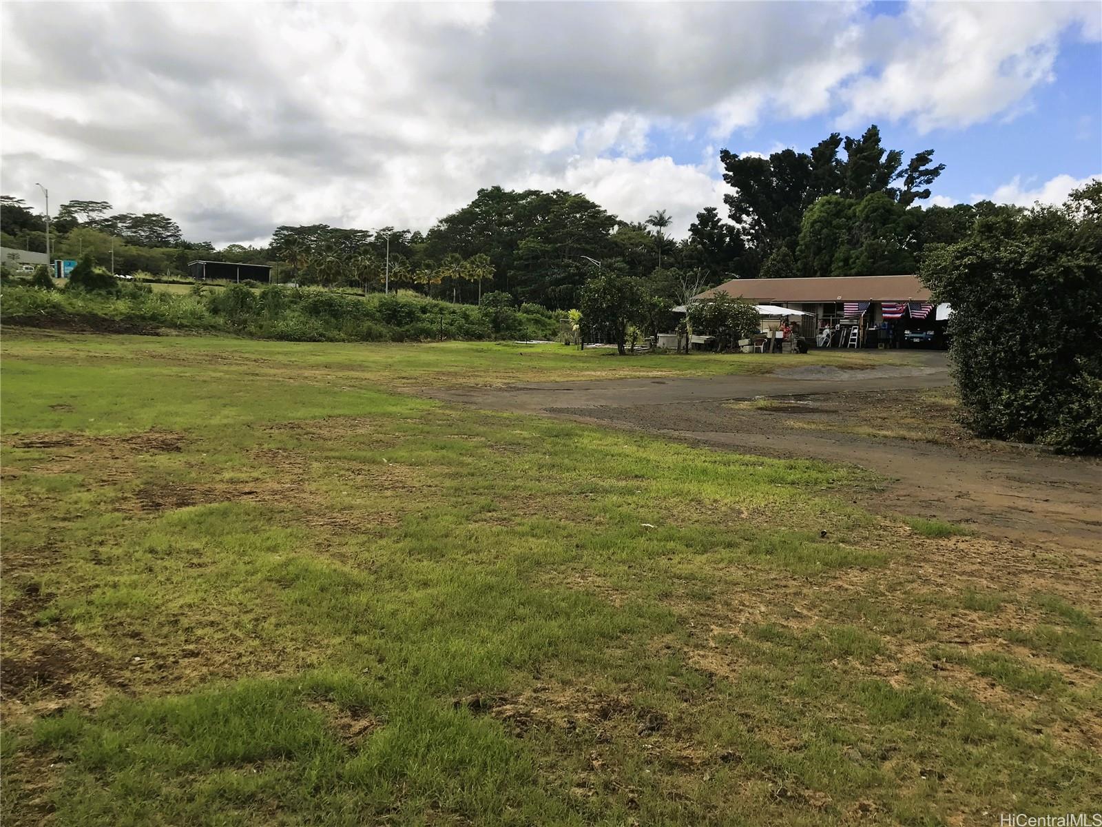 1322 Ululani Street Hilo, HI 96720 - Photo 3 of 4 a view of a lake with houses