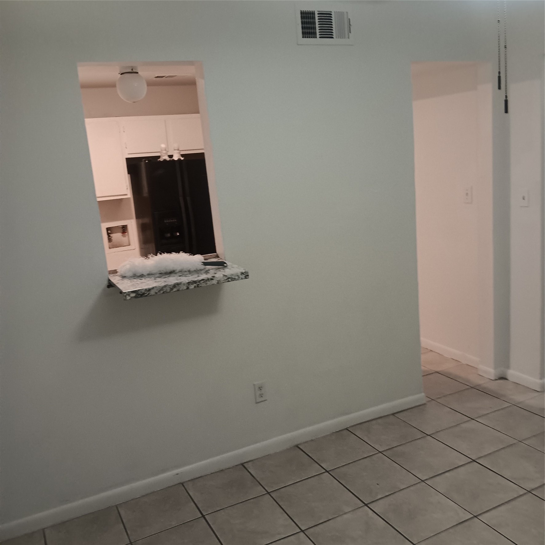 521 Ferguson Street, Unit B1 Humble, TX 77338 - Photo 3 of 7 view of room with window