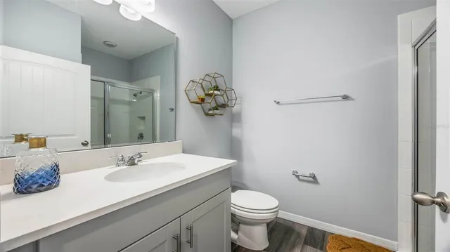 a view of a room with gym equipment and a large window