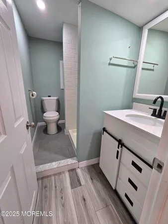 a bathroom with a sink and a toilet