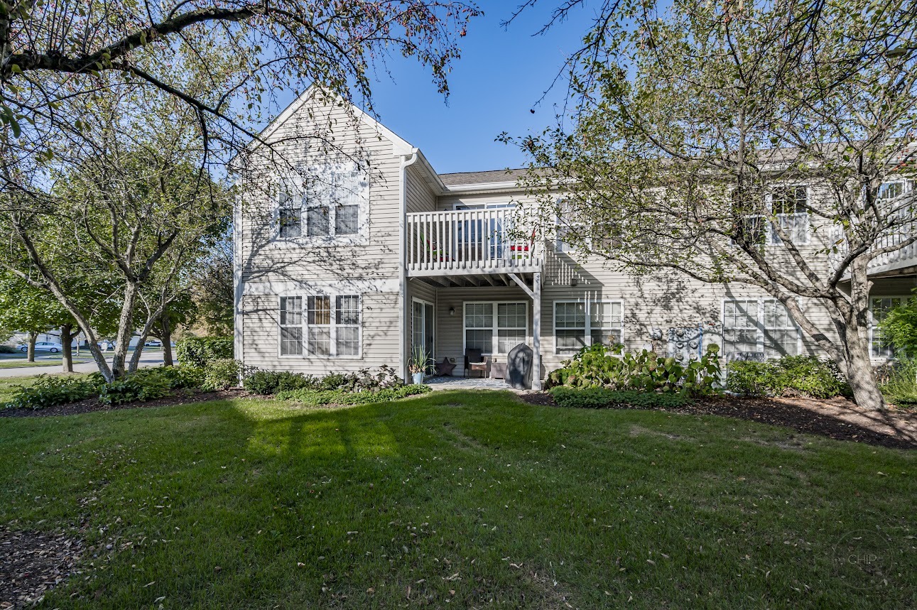 2827 Rutland Circle, Unit 101 Naperville, IL 60564 - Photo 22 of 25 a view of an apartment with a garden