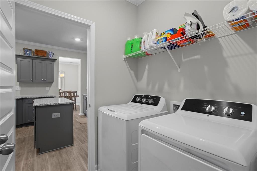217 Eva Way Cartersville, GA 30121 - Photo 12 of 27 a utility room with dryer and washer