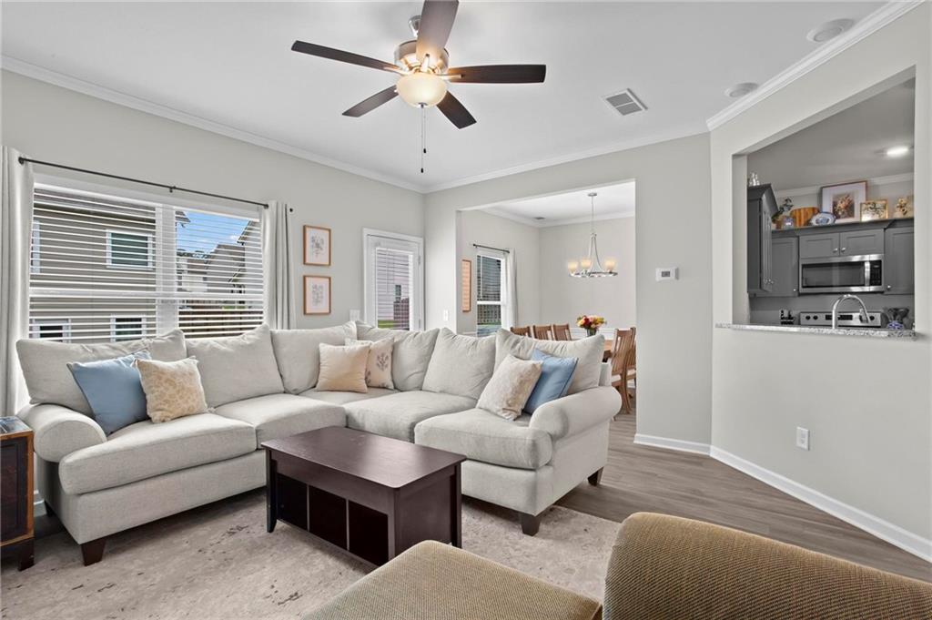 217 Eva Way Cartersville, GA 30121 - Photo 7 of 27 a living room with furniture and a large window