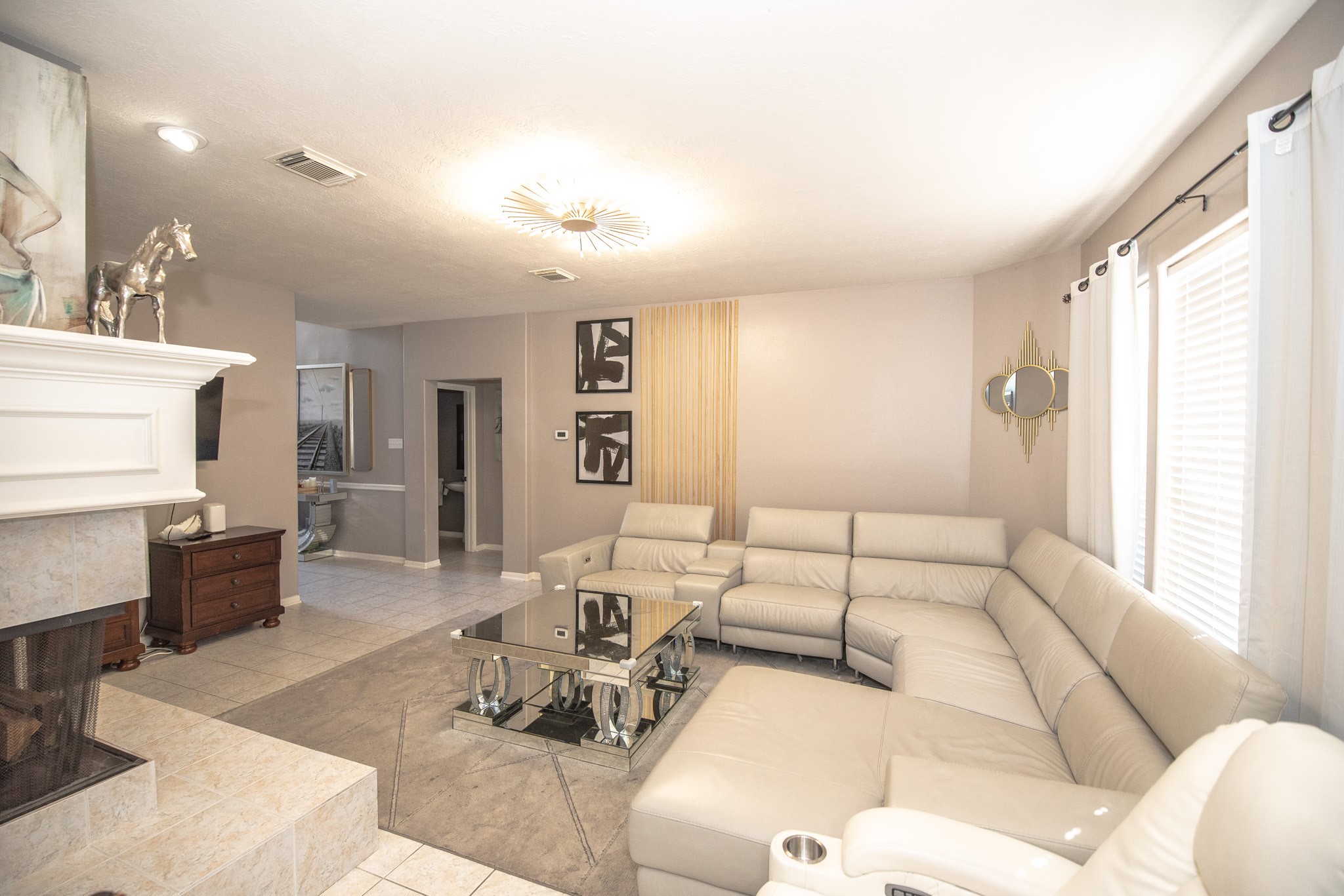 19115 South Rim Trail Spring, TX 77388 - Photo 7 of 21 a living room with furniture and a large window