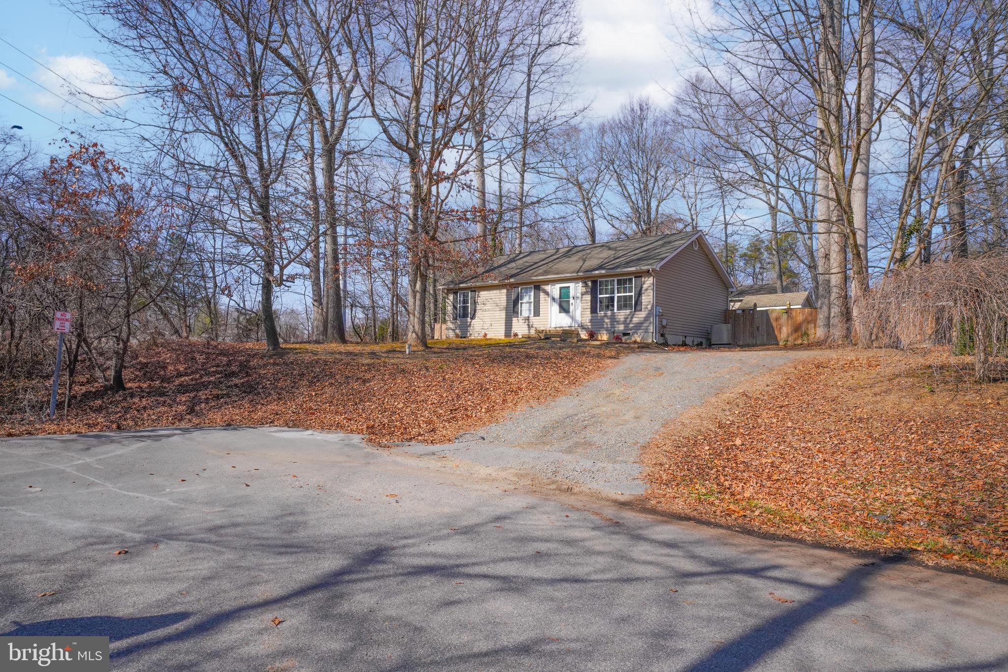 563 Maple Way Lusby, MD 20657 - Photo 3 of 16 a view of large house with a outdoor space