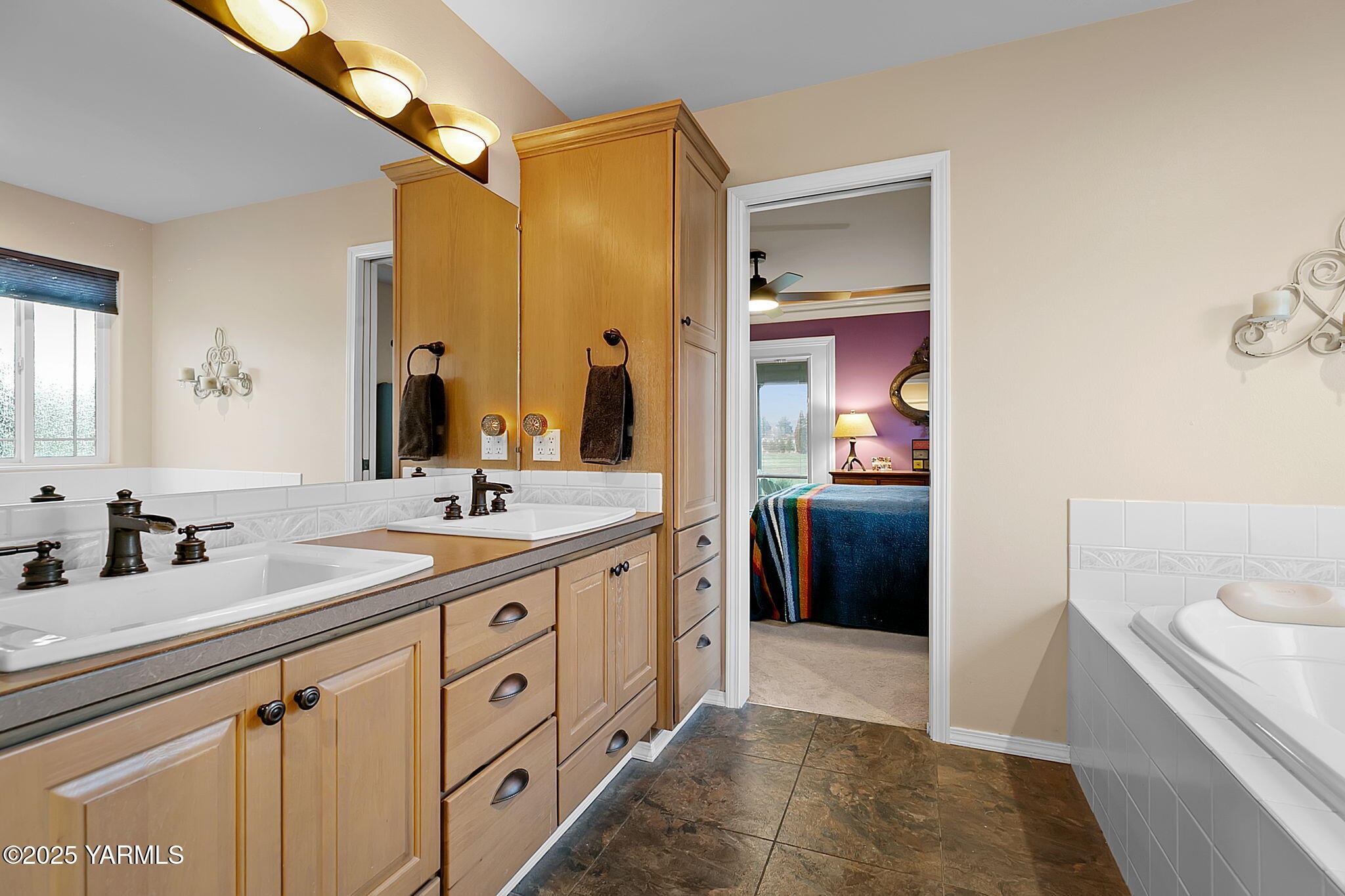 1701 Mapleway Road Yakima, WA 98908 - Photo 16 of 35 a spacious bathroom with a double vanity sink a mirror and a shower