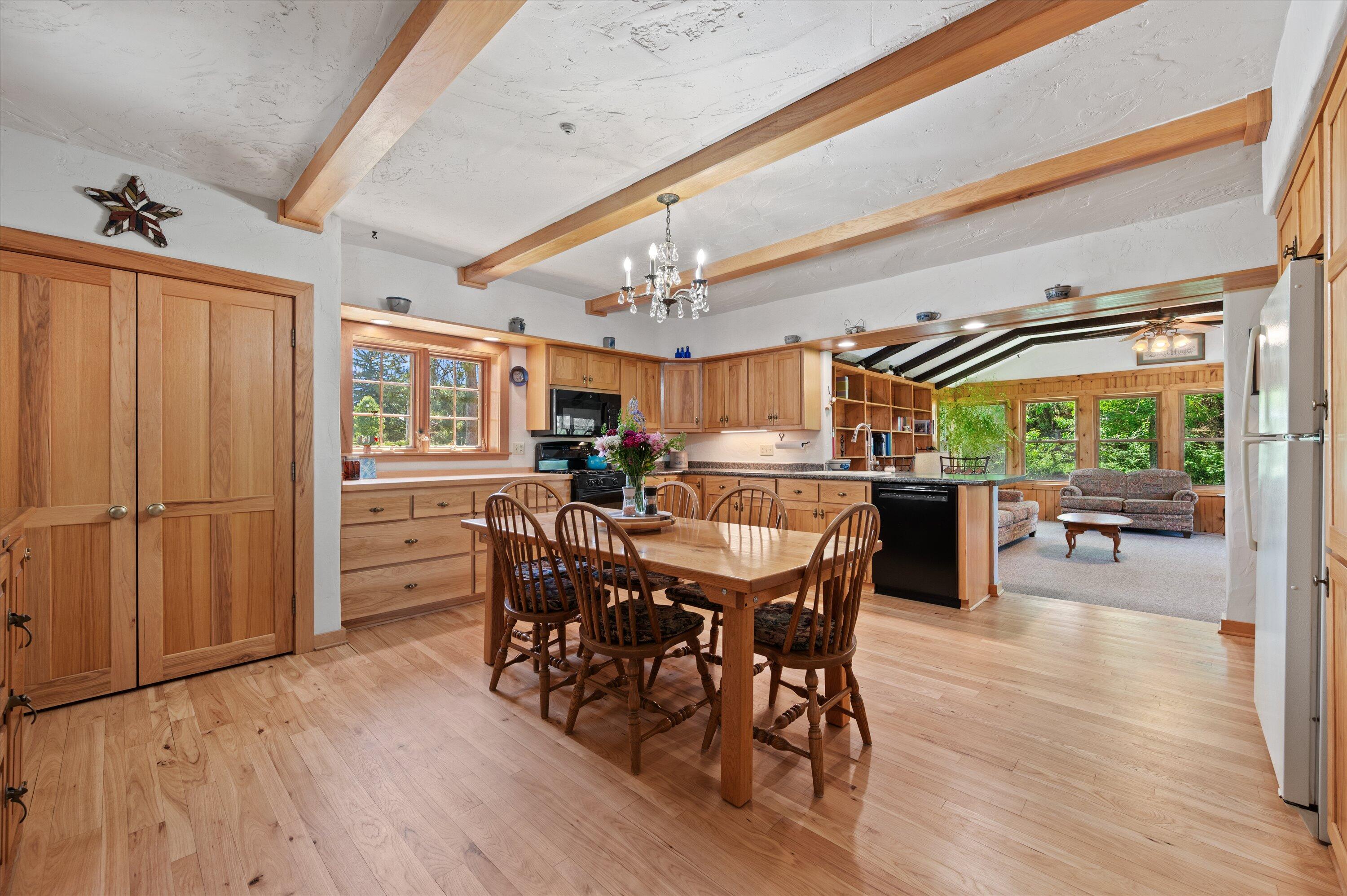 N9523 North River Road Ixonia, WI 53036 - Photo 13 of 55 Beamed ceilings, large pantry