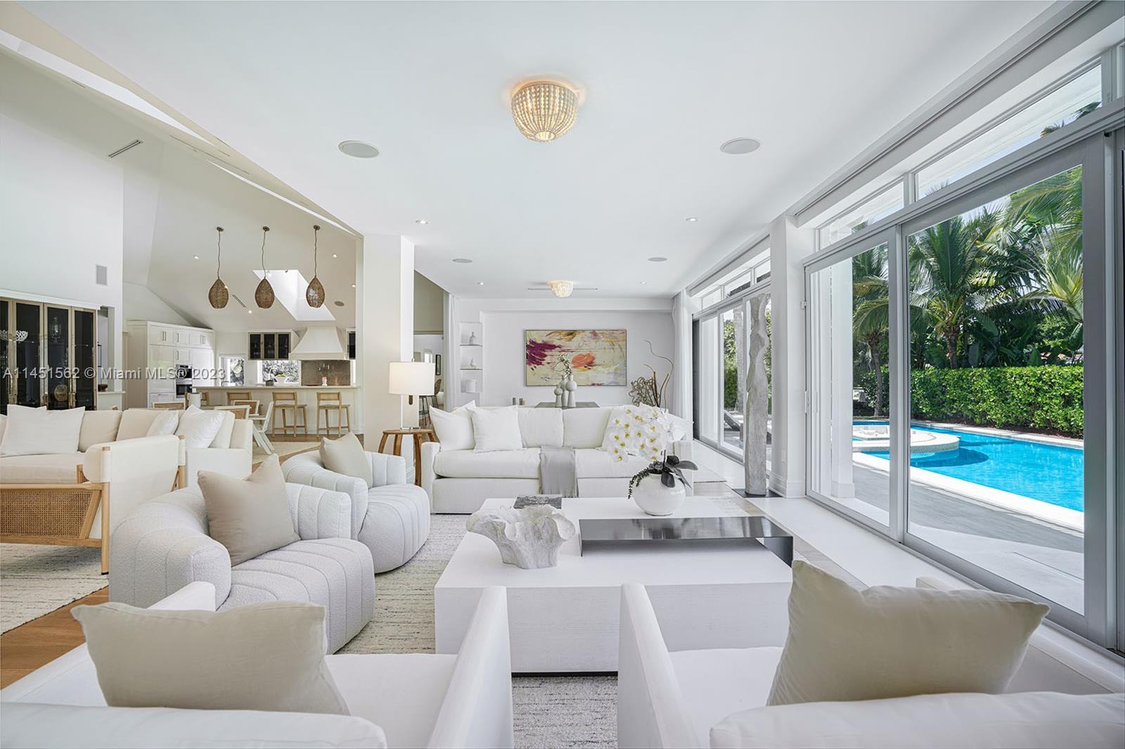 761 Buttonwood Lane Miami, FL 33137 - Photo 13 of 64 a living room with furniture and a large window