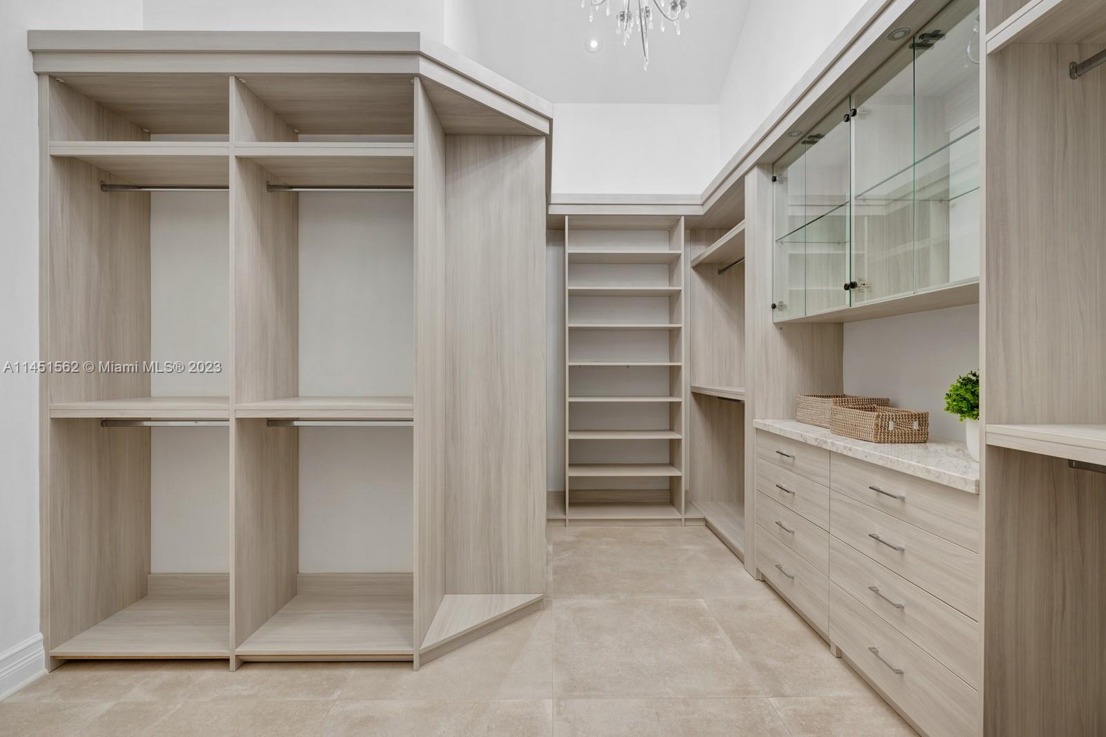 761 Buttonwood Lane Miami, FL 33137 - Photo 21 of 64 a view of an empty walk in closet