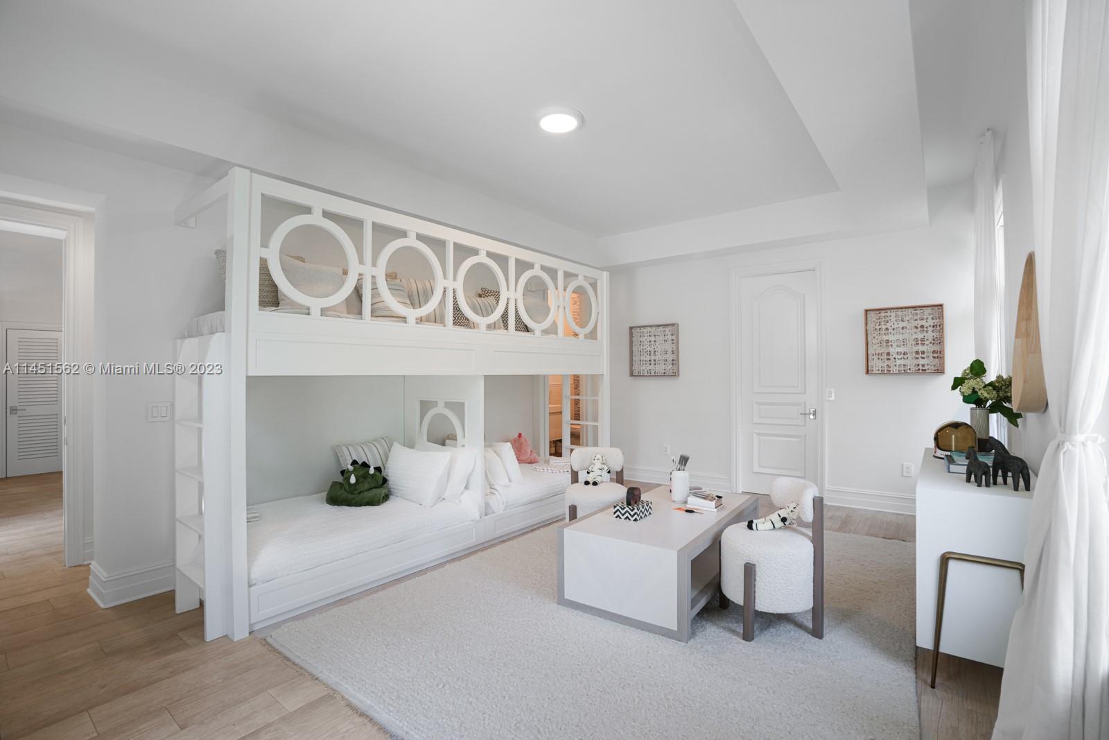 761 Buttonwood Lane Miami, FL 33137 - Photo 28 of 64 a living room with furniture and flowers