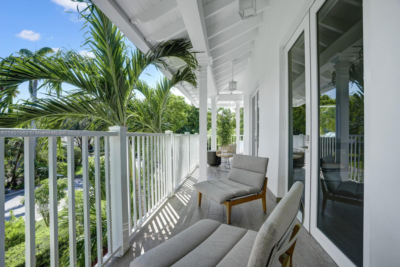 761 Buttonwood Lane Miami, FL 33137 - Photo 35 of 64 a view of balcony with furniture