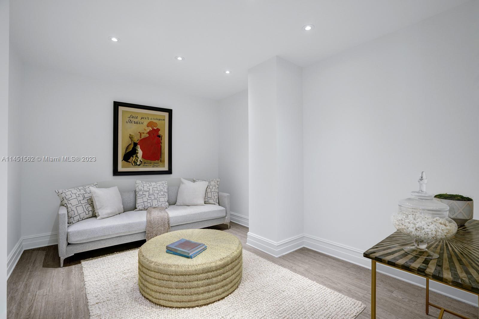 761 Buttonwood Lane Miami, FL 33137 - Photo 36 of 64 a living room with furniture and a couch