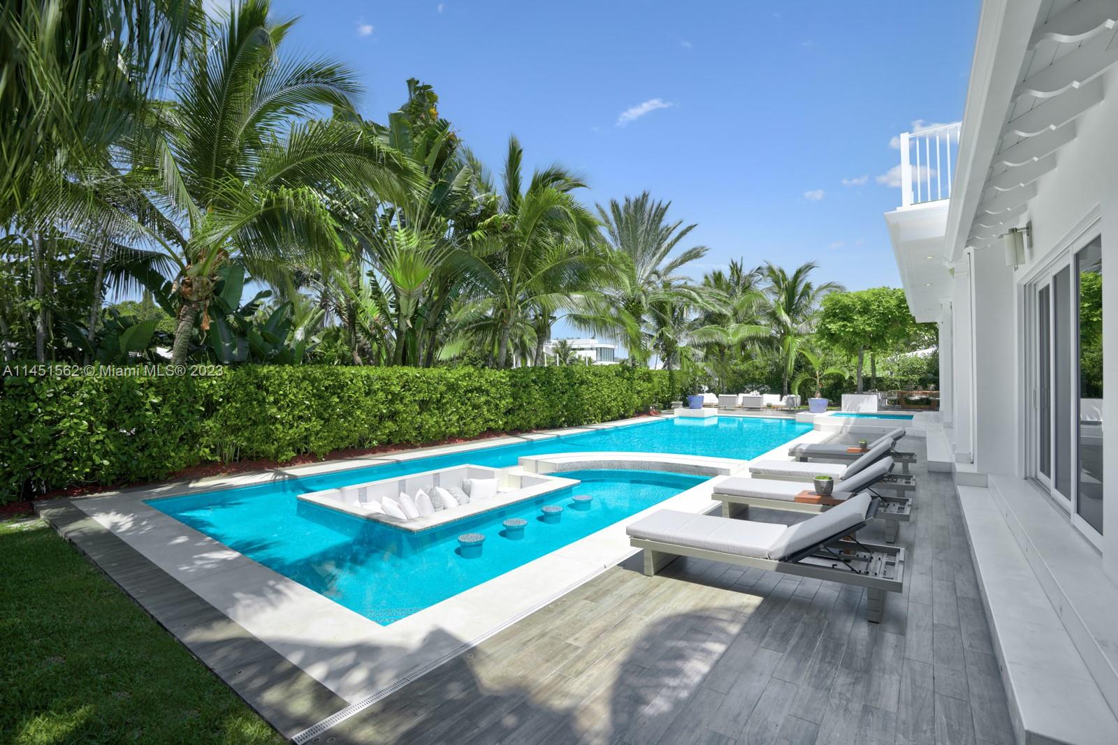 761 Buttonwood Lane Miami, FL 33137 - Photo 43 of 64 a view of a patio with swimming pool