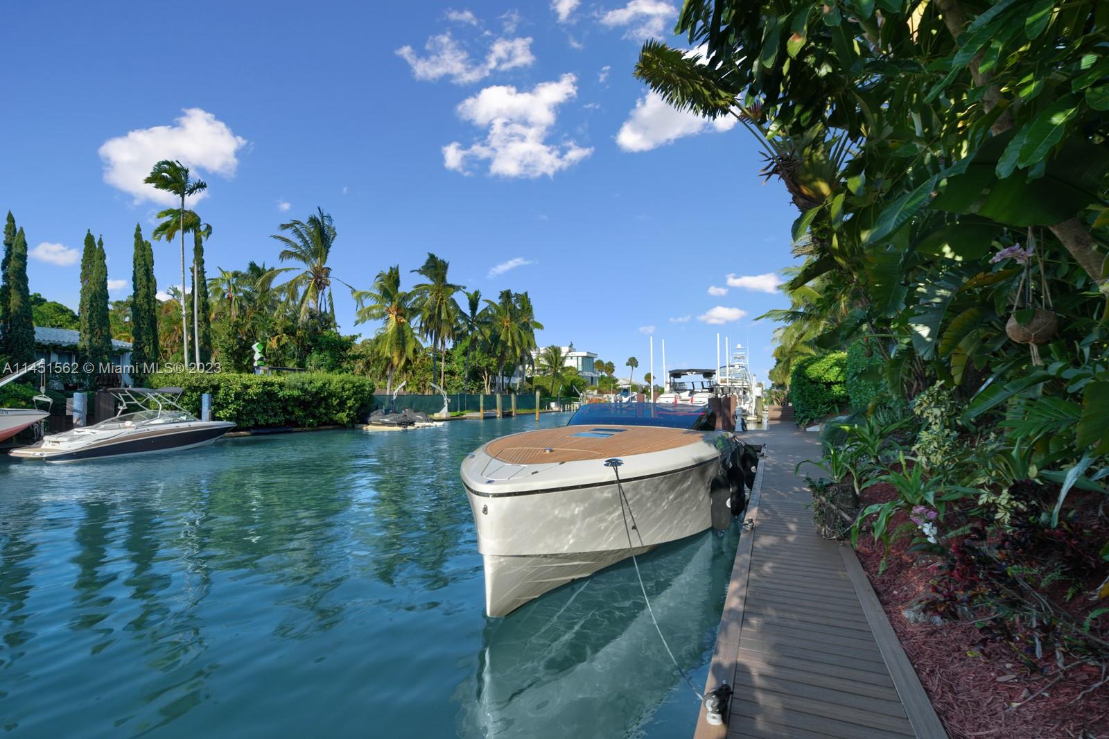 761 Buttonwood Lane Miami, FL 33137 - Photo 46 of 64 a view of a fountain in the garden