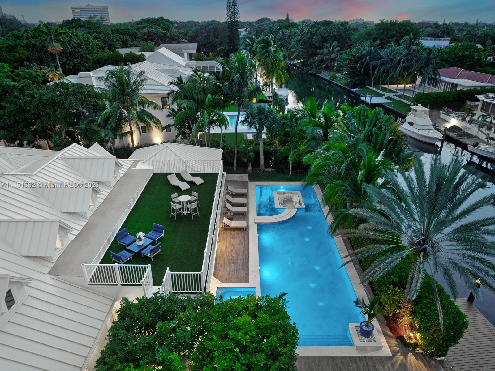 761 Buttonwood Lane Miami, FL 33137 - Photo 58 of 64 an aerial view of a house with garden space and street view