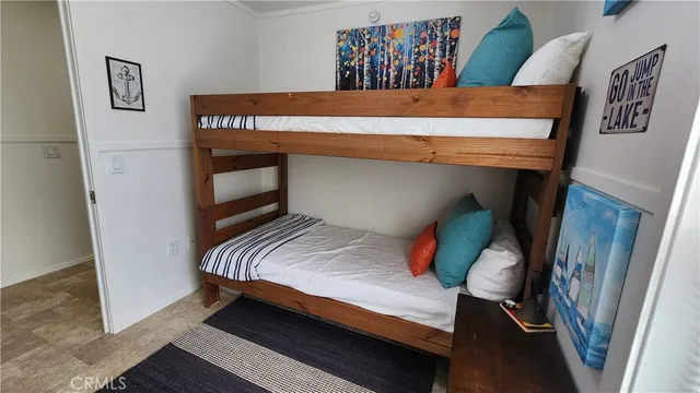 a bathroom with a toilet sink and shower
