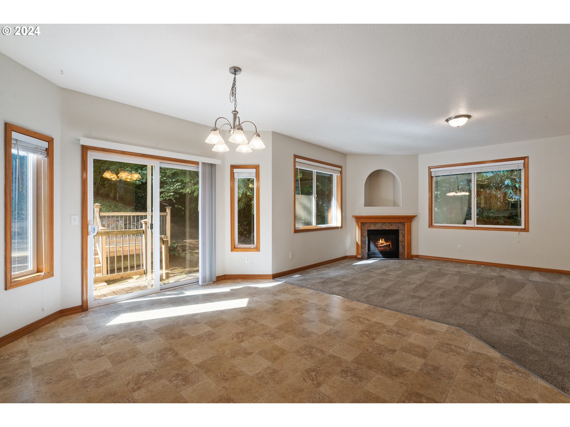 8009 Northeast 16th Street Vancouver, WA 98664 - Photo 16 of 46 a view of an empty room with window and fireplace
