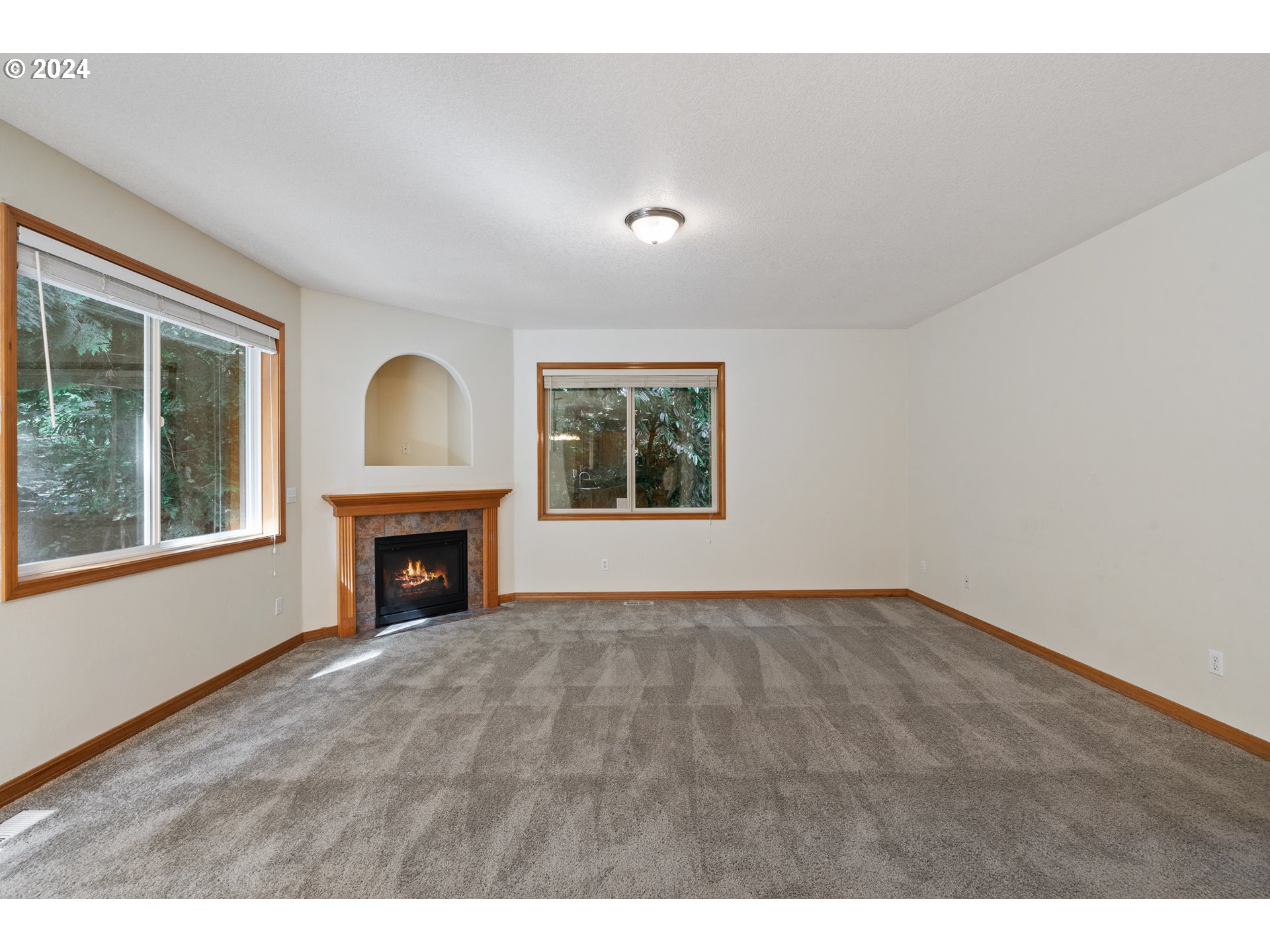8009 Northeast 16th Street Vancouver, WA 98664 - Photo 18 of 46 a view of an empty room with window and fire place
