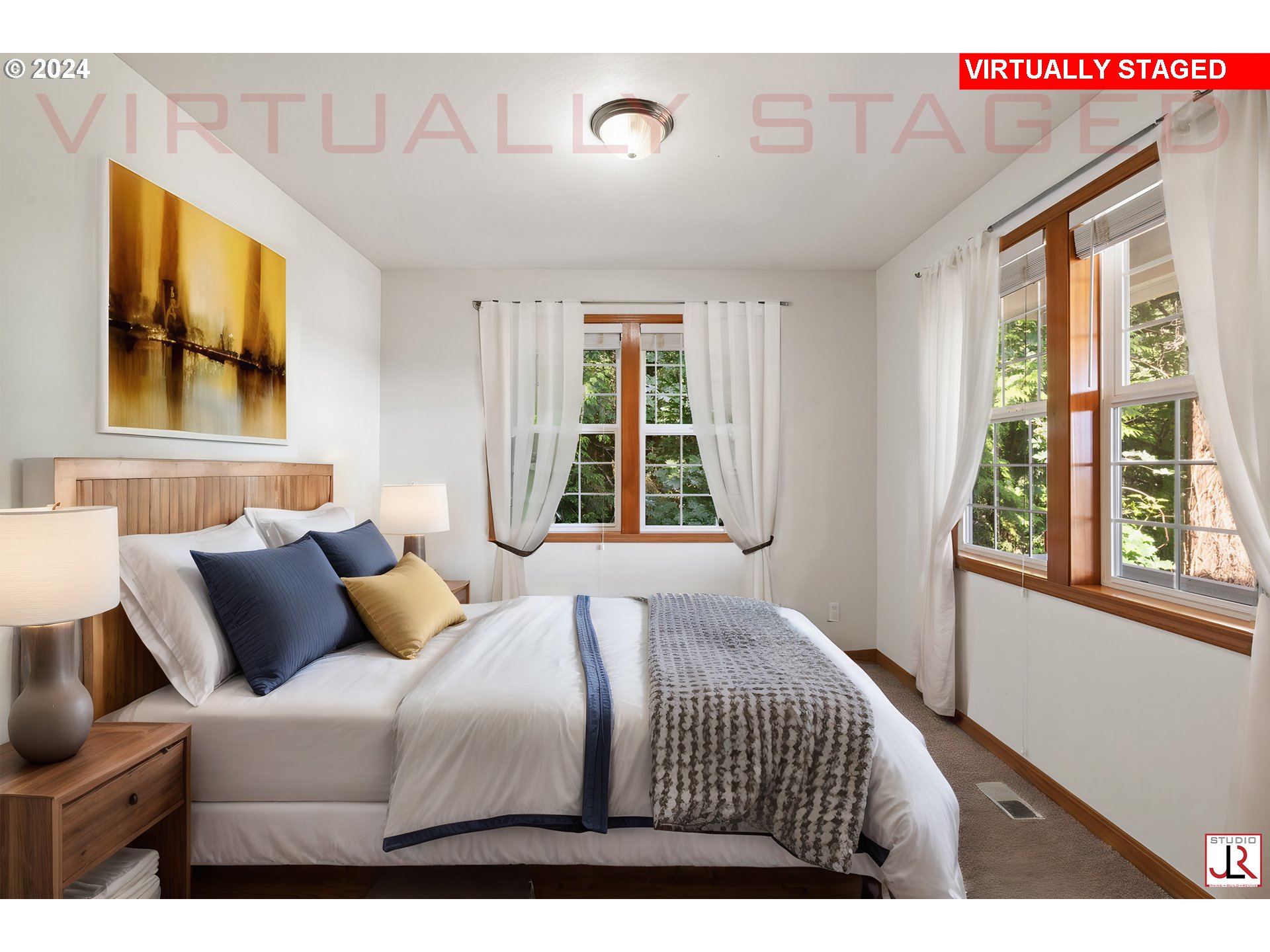 8009 Northeast 16th Street Vancouver, WA 98664 - Photo 22 of 46 a bedroom with a bed and a large window