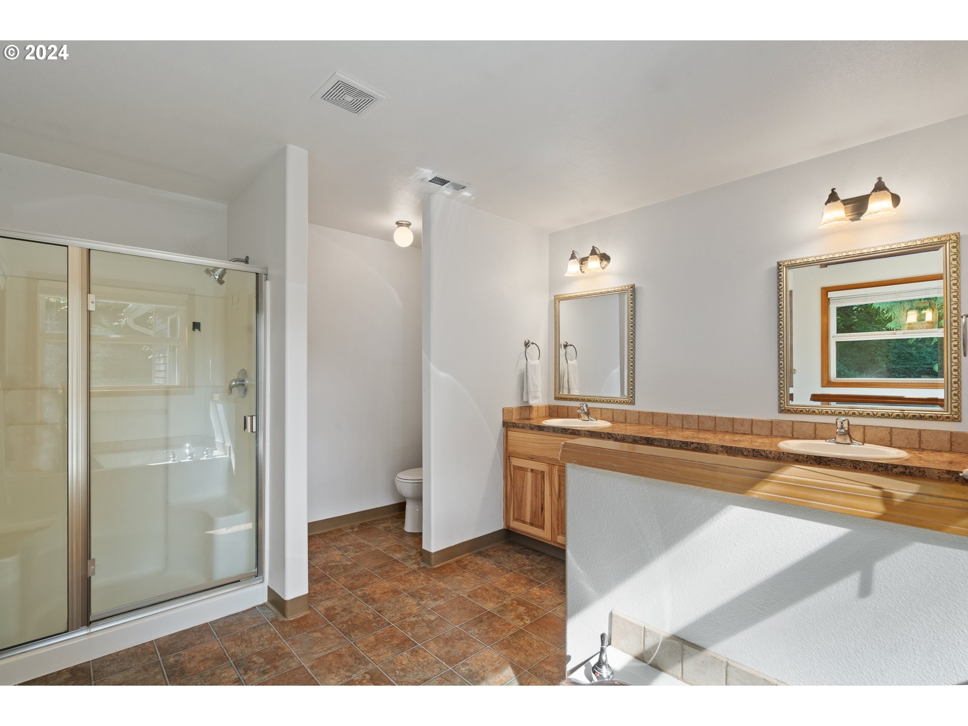 8009 Northeast 16th Street Vancouver, WA 98664 - Photo 31 of 46 a spacious bathroom with a tub and sink