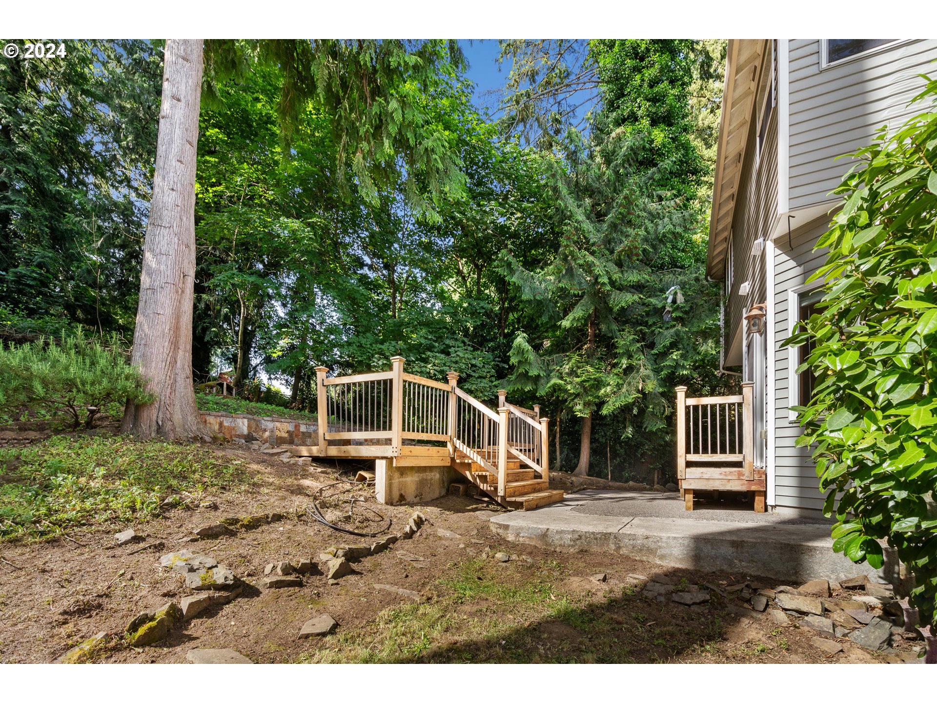 8009 Northeast 16th Street Vancouver, WA 98664 - Photo 41 of 46 a house with trees in front of it