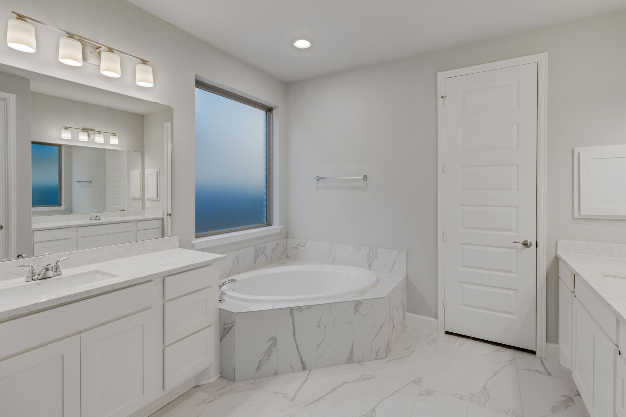 17467 Bayflower Conroe, TX 77385 - Photo 23 of 44 a bathroom with a sink and a mirror