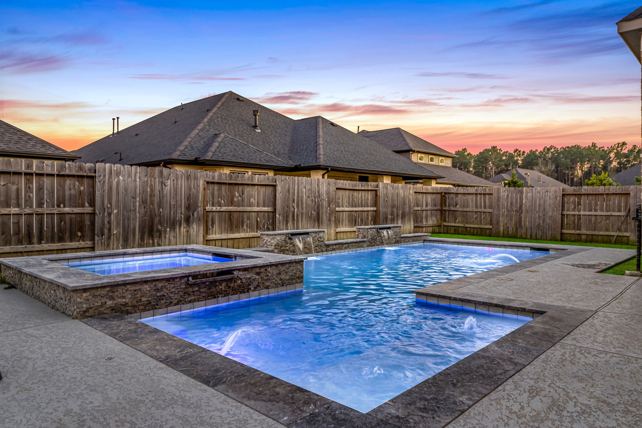 17467 Bayflower Conroe, TX 77385 - Photo 36 of 44 a view of a house with swimming pool