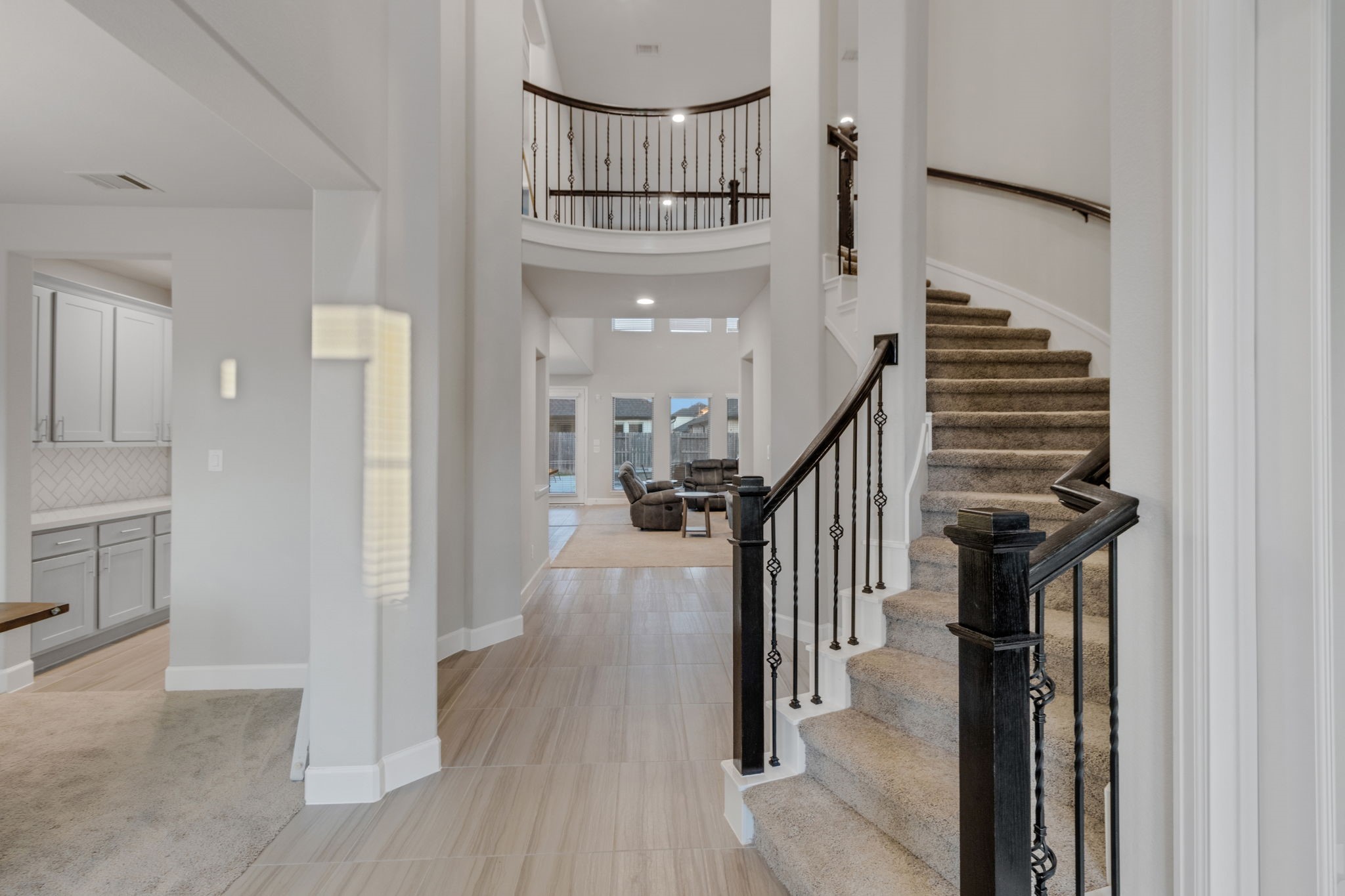17467 Bayflower Conroe, TX 77385 - Photo 4 of 44 a view of entryway and hall with wooden floor