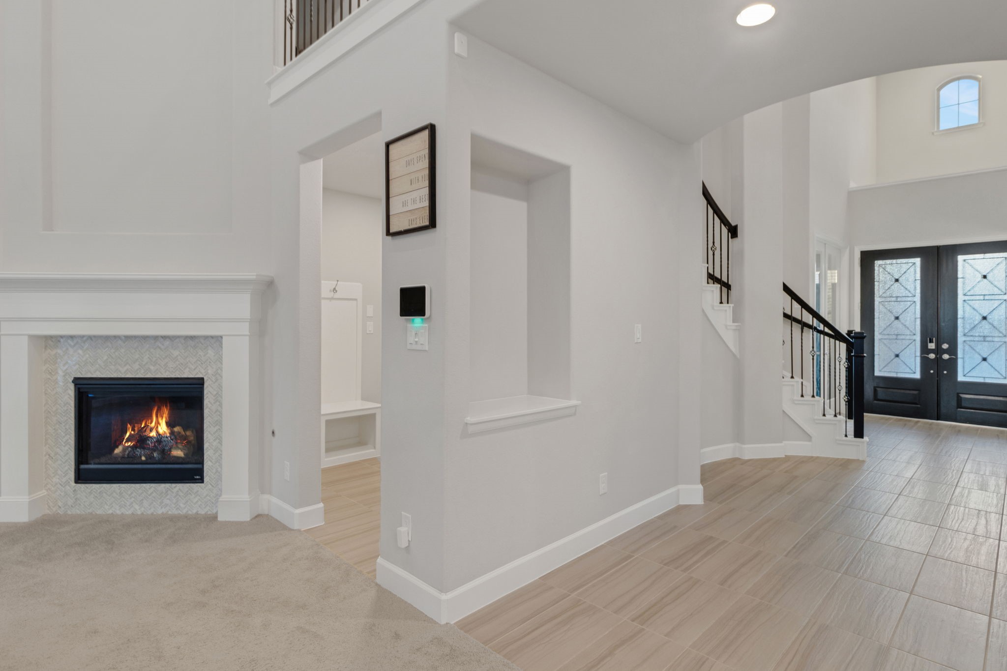 17467 Bayflower Conroe, TX 77385 - Photo 6 of 44 a view of an empty room with wooden floor and fireplace