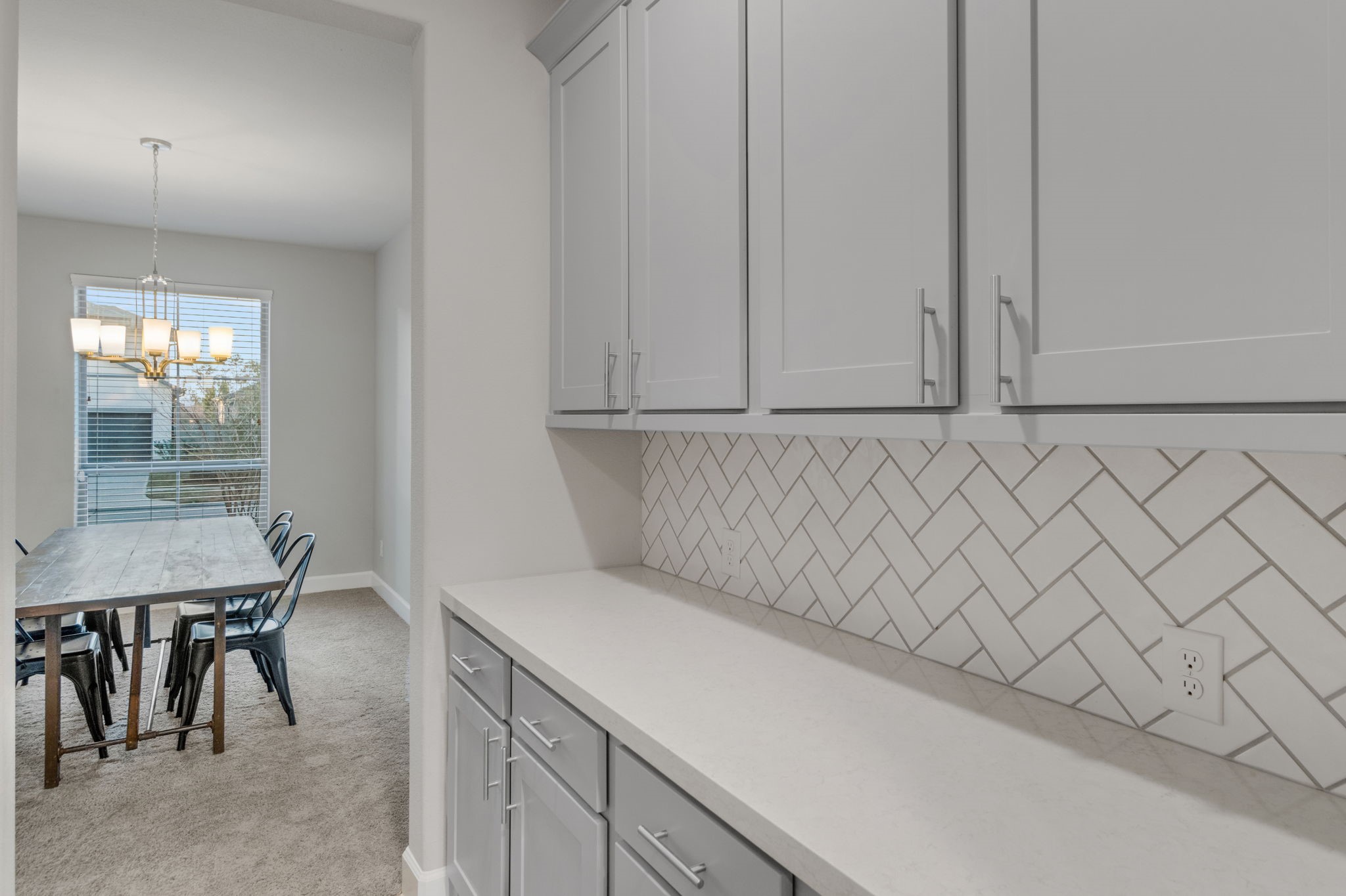 17467 Bayflower Conroe, TX 77385 - Photo 9 of 44 a room with a sink and cabinets
