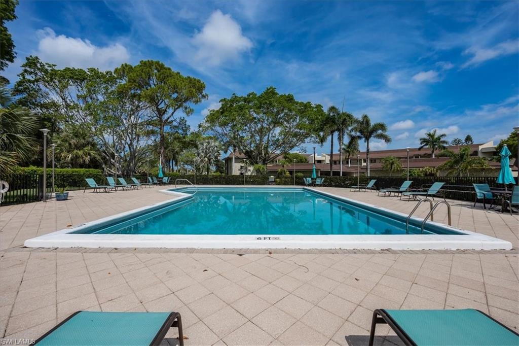 415 Augusta Boulevard, Unit 110 Naples, FL 34113 - Photo 28 of 31 a view of a backyard