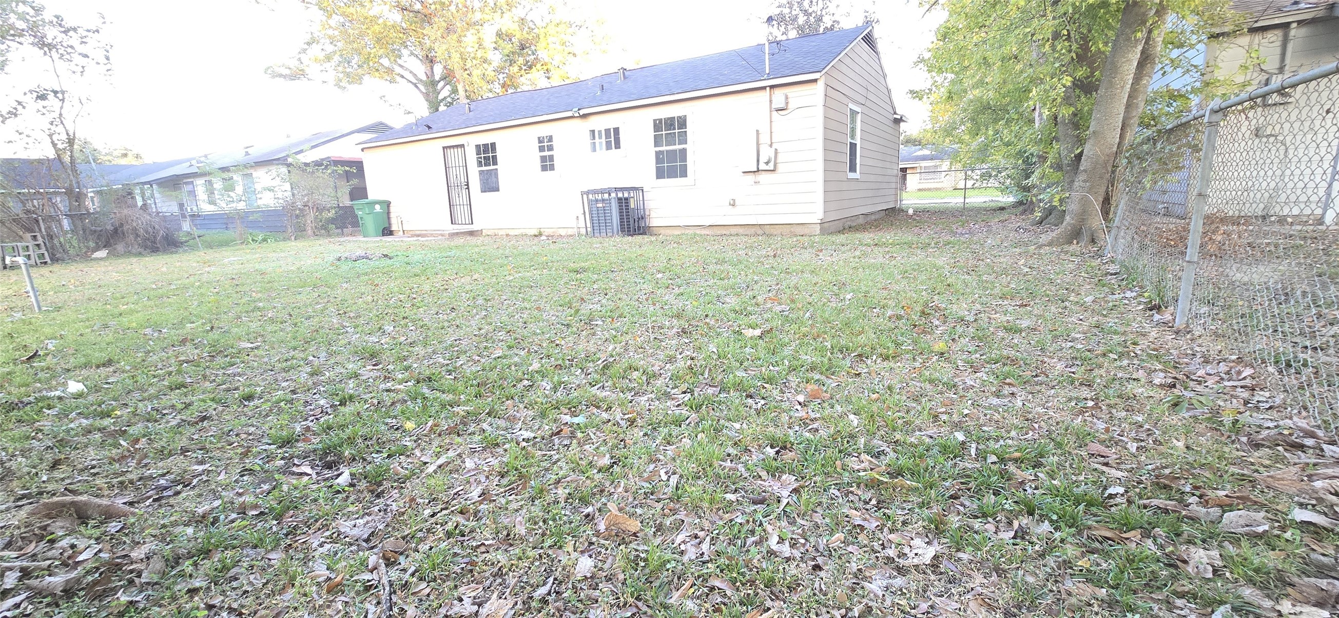 9410 Rosehaven Drive Houston, TX 77051 - Photo 8 of 8 a view of white house with yard and sitting area