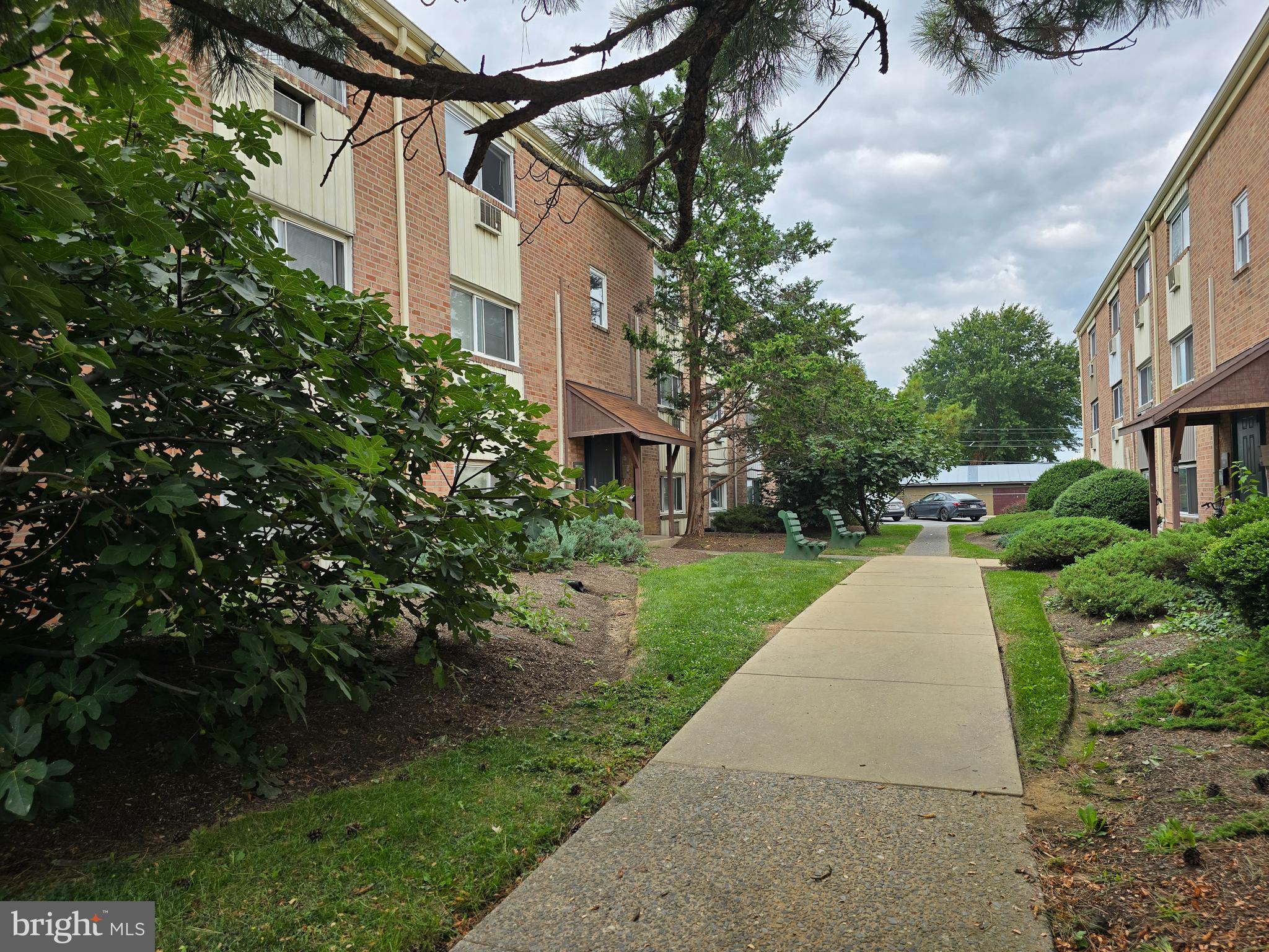 8125 West Chester Pike, Unit A4 Upper Darby, PA 19082 - Photo 3 of 14 a view of a pathway with a house