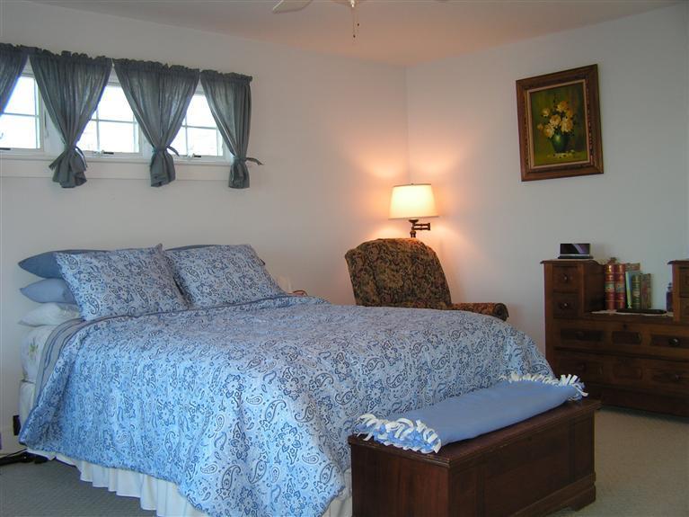 132 Bay Shore Road Hyannis, MA 02601 - Photo 17 of 34 a bedroom with a bed and window